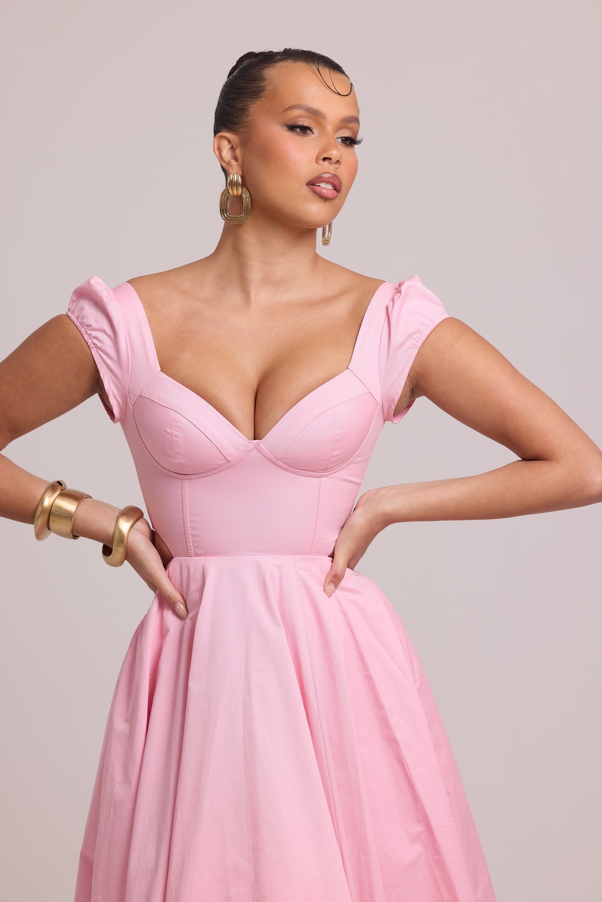 Roselle dress featuring adjustable lace-up back and pockets