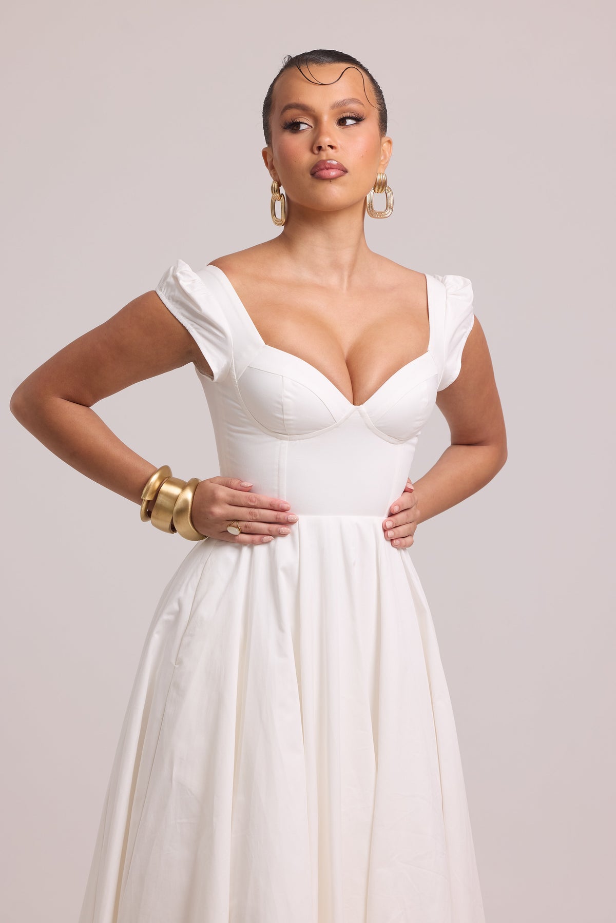 White full skirt dress with added volume from tulle under-layer