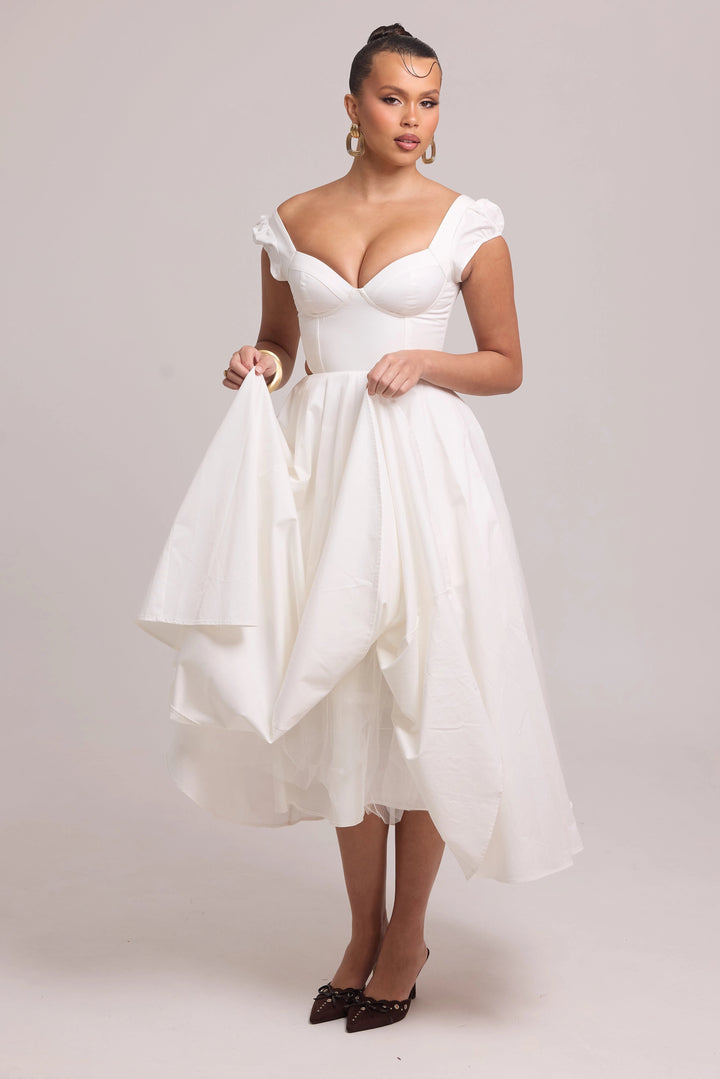 Lightweight white cotton dress with soft movement