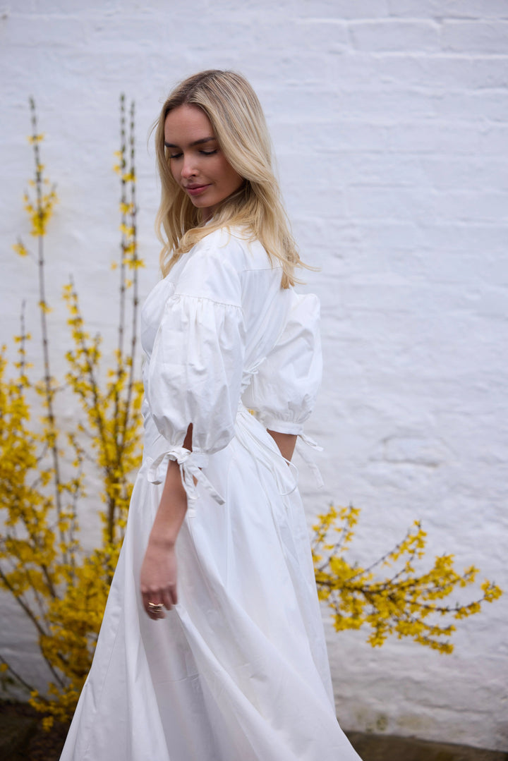 Lightweight white cotton dress with soft movement