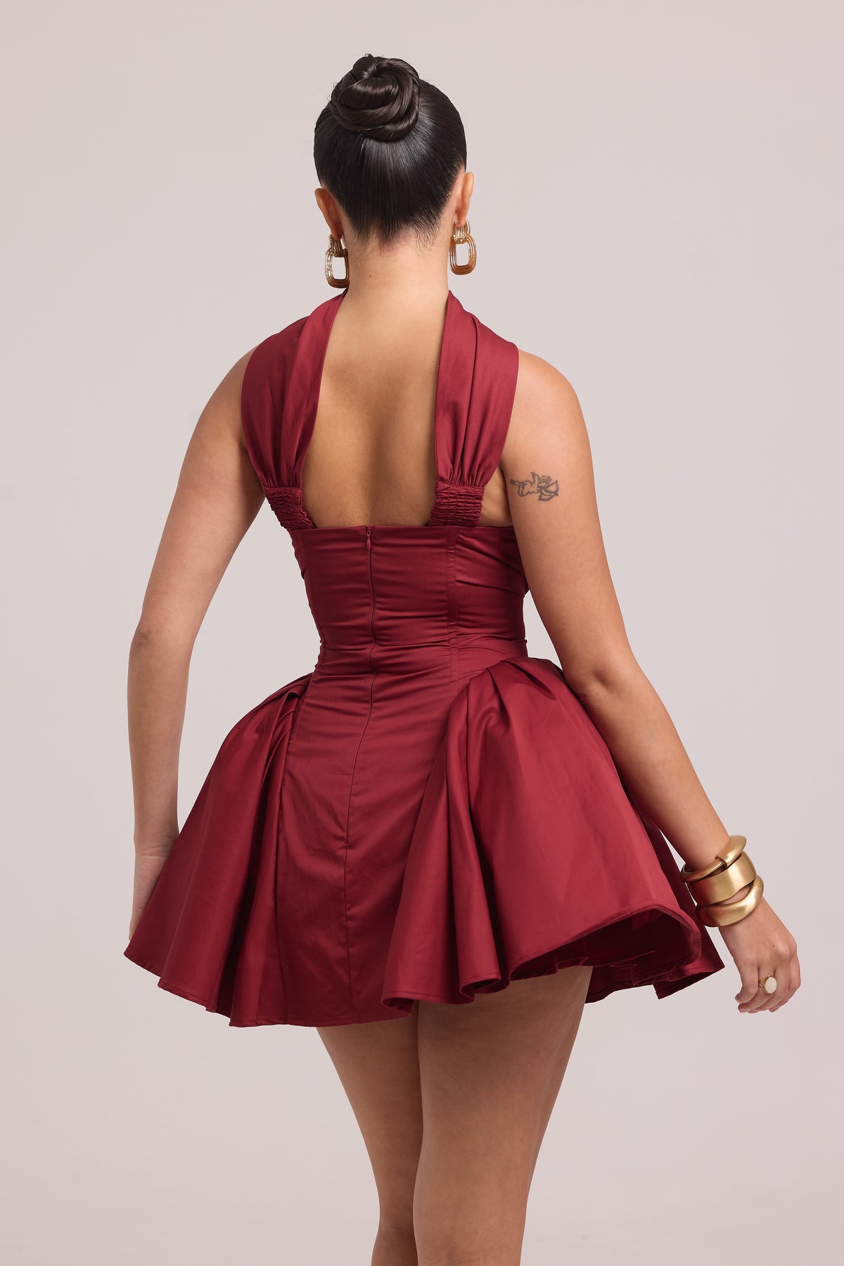 Strapless mini dress with detachable neck band and structured fit
