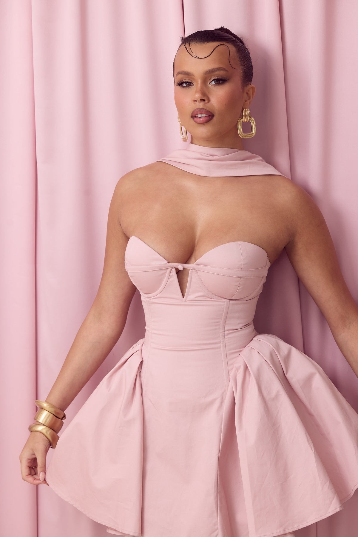 Mini dress with contoured waist and voluminous side panels