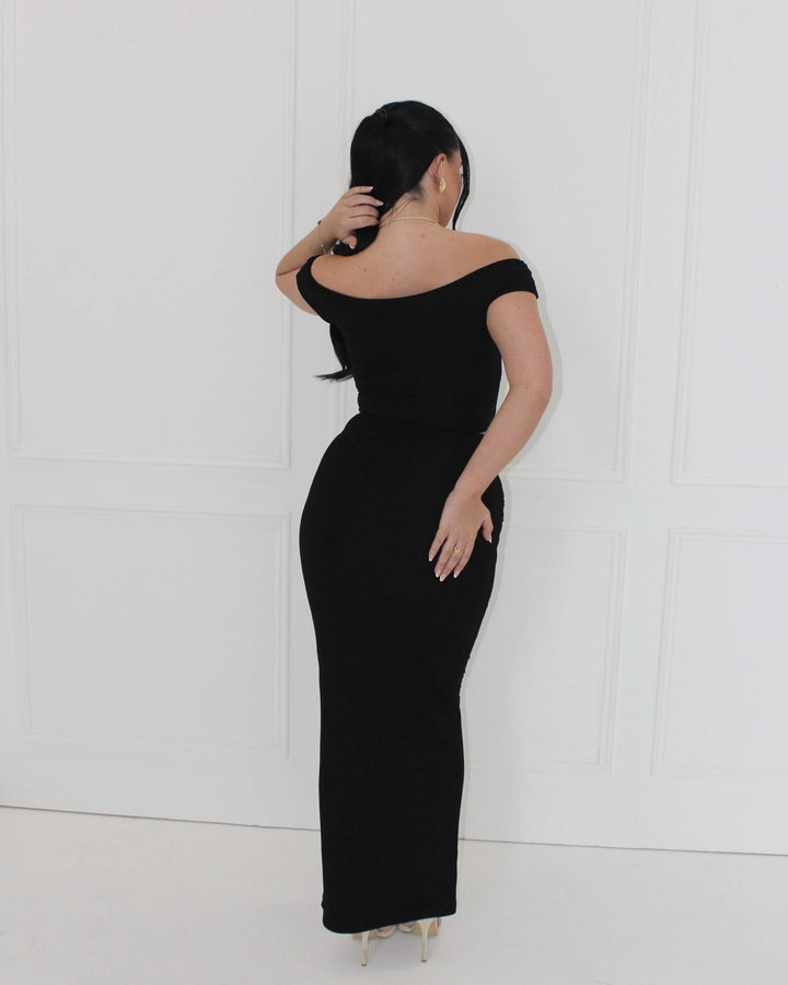 model showing back view of Elara maxi skirt